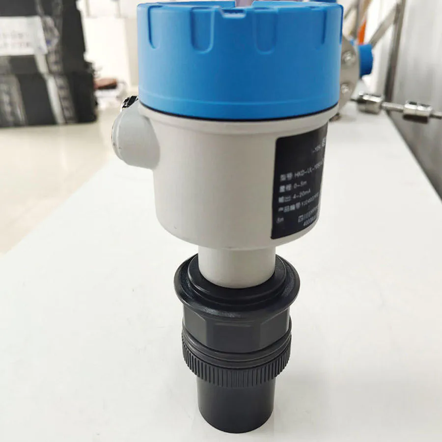 Ultrasonic level detector with non-contact probe design for industrial liquid level detection.