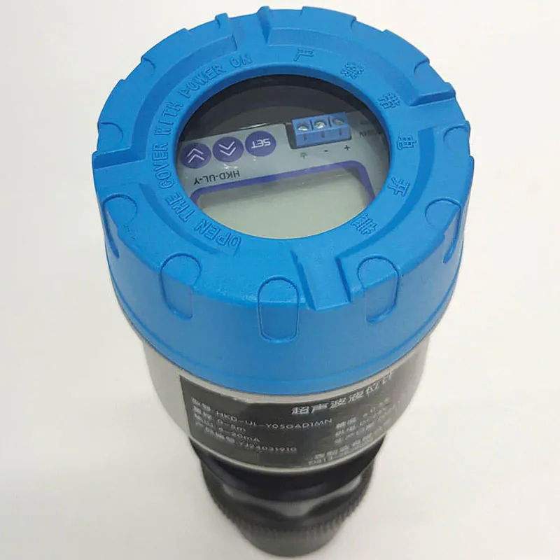 Integrated ultrasonic level sensor with display for non-contact liquid level measurement in industrial tanks.