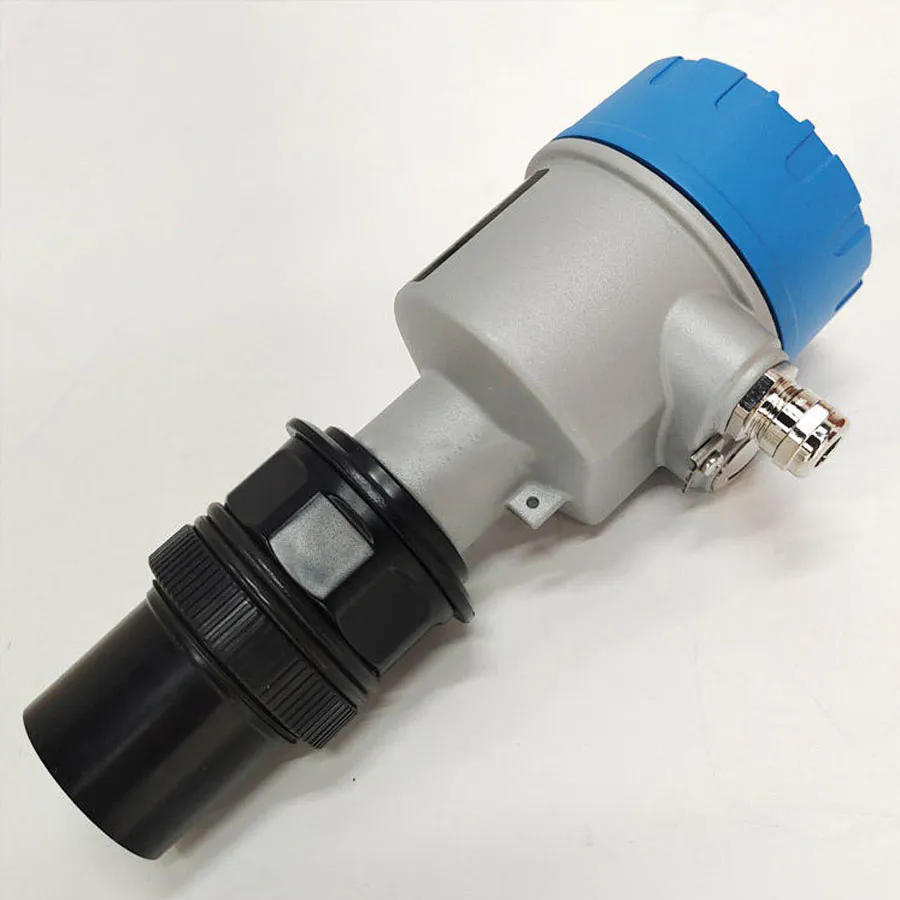 Ultrasonic tank level sensor designed for continuous level measurement in industrial storage tanks.