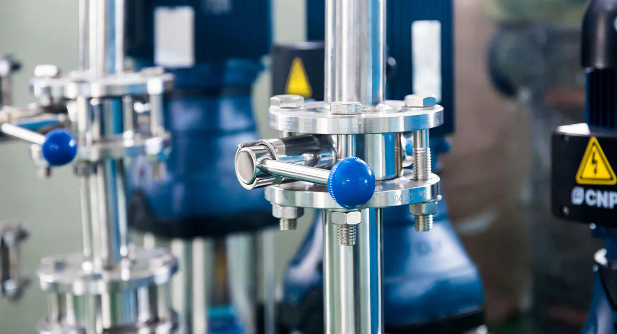 Industrial pressure transmitter with 4-20mA output installed on stainless steel piping for process pressure measurement