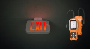 Toxic gas detector and safety exit sign in industrial environments VOC and toxic gas detection for industrial safety and emergency exit guidance