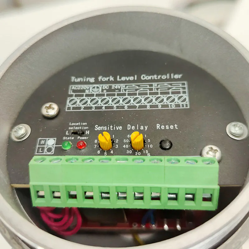 Tuning fork level switch controller wiring terminals and sensitivity adjustment panel