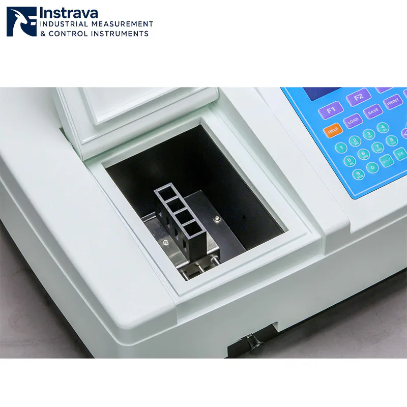 Laboratory UV-Vis test machine with digital display control for measuring sample light absorption properties.