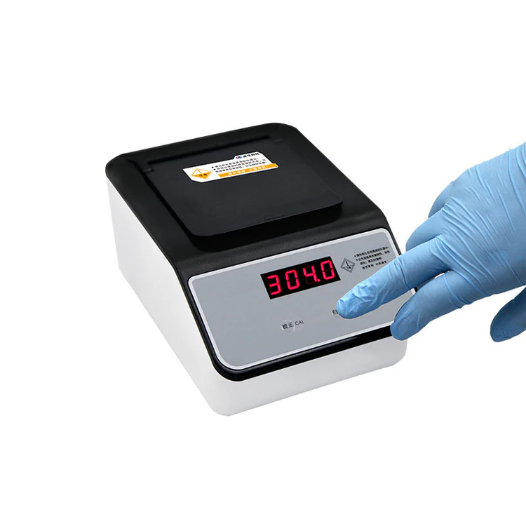 Handheld water quality analyzer, conducting a test