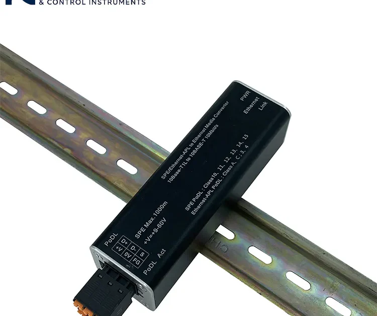 Ethernet-APL to standard Ethernet universal media converter mounted on a DIN rail.