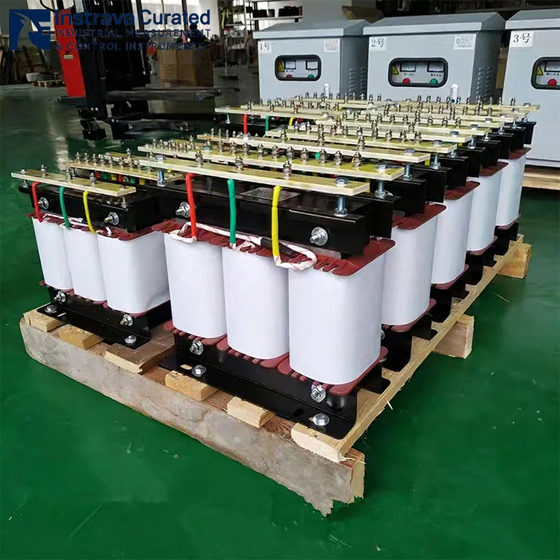 Batch of bare three-phase dry isolation transformers neatly arranged in workshop, unified winding structure for grid renovation and bulk power distribution project supply