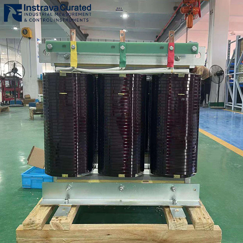Real shot of three-phase dry-type isolation transformer windings, showing copper windings and insulating frame, for high-load industrial power distribution applications