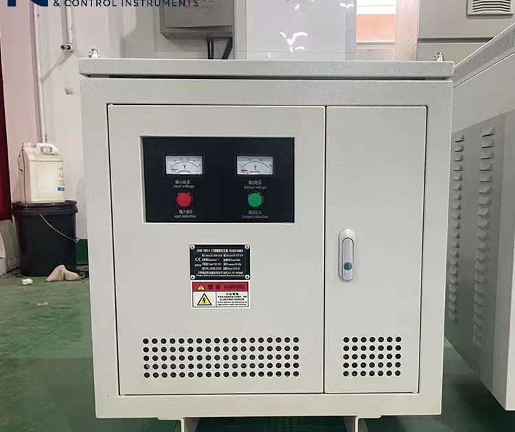 Three-phase dry-type isolation transformer with cooling vents and dual voltmeters, fully enclosed cabinet design, for industrial automation equipment power supply applications