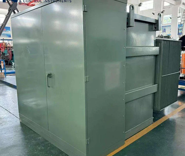 Overall view of pad-mounted transformer, showing fully enclosed cabinet and cooling radiators, for outdoor prefabricated substation applications