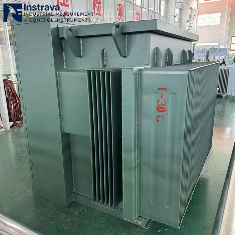 Side view of pad-mounted transformer, showing corrugated cooling radiators and fully enclosed cabinet, for outdoor industrial power distribution applications